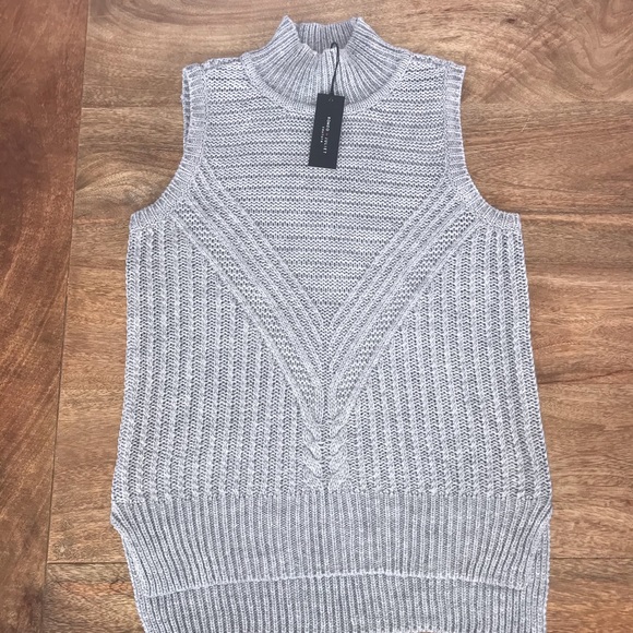 Romeo & Juliet Couture Sweaters - Romeo + Juliet couture sleeveless turtleneck.